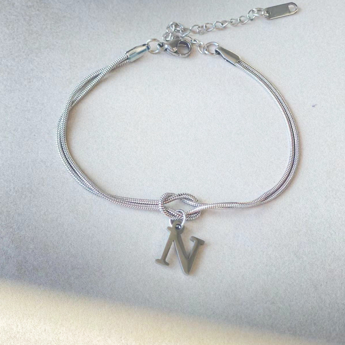 A-Z Love Knot Bracelet – Personalized Gold Charm