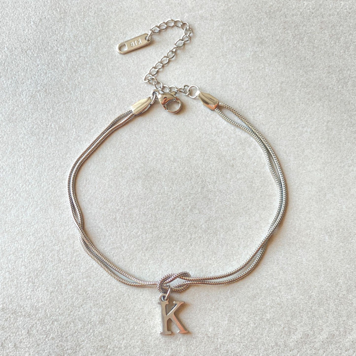 A-Z Love Knot Bracelet – Personalized Gold Charm