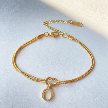 A-Z Love Knot Bracelet – Personalized Gold Charm