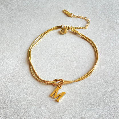 A-Z Love Knot Bracelet – Personalized Gold Charm