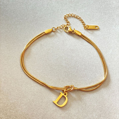 A-Z Love Knot Bracelet – Personalized Gold Charm