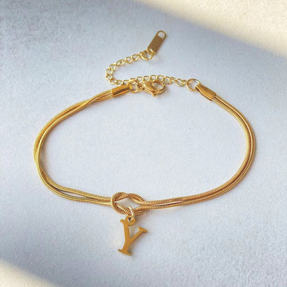 A-Z Love Knot Bracelet – Personalized Gold Charm