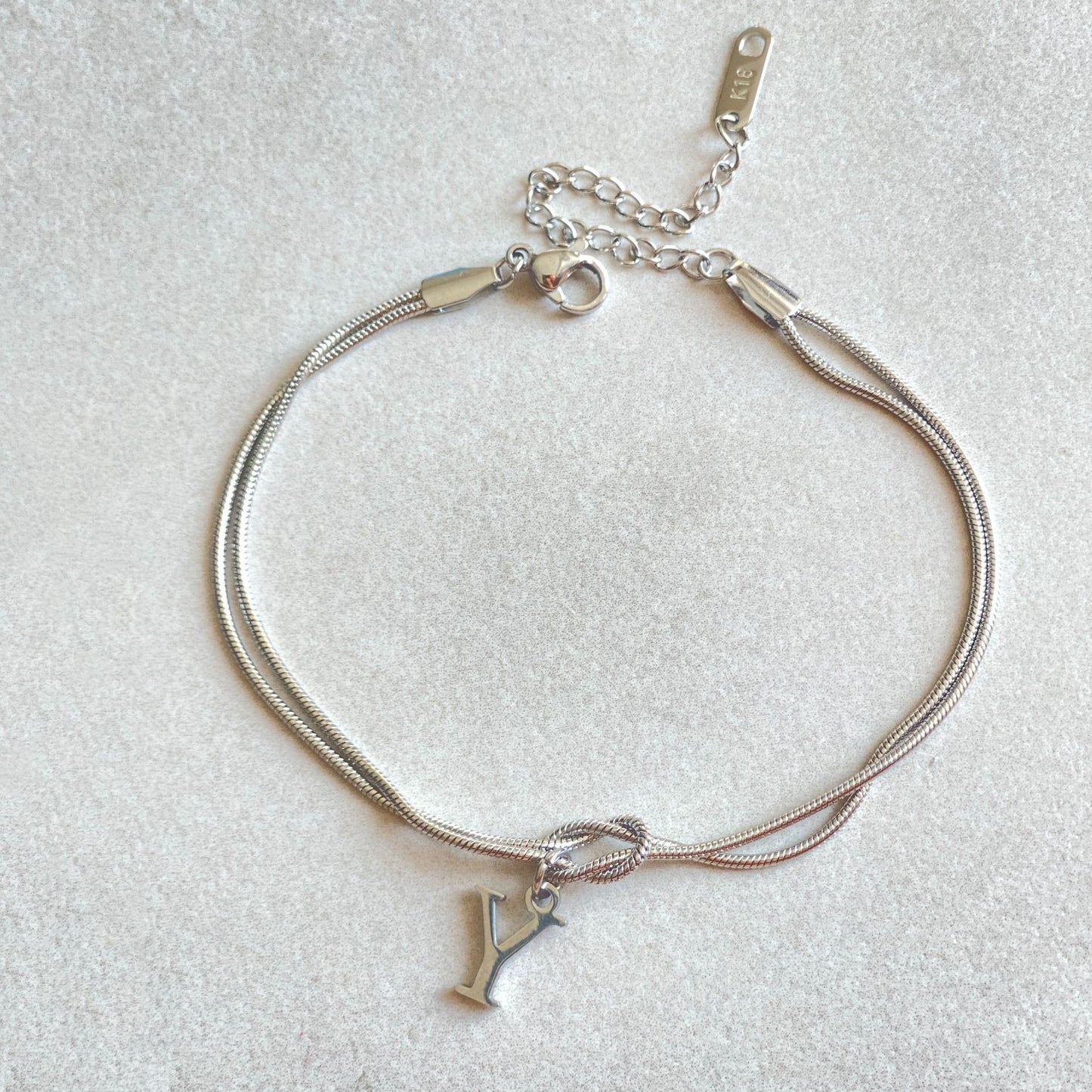 A-Z Love Knot Bracelet – Personalized Gold Charm