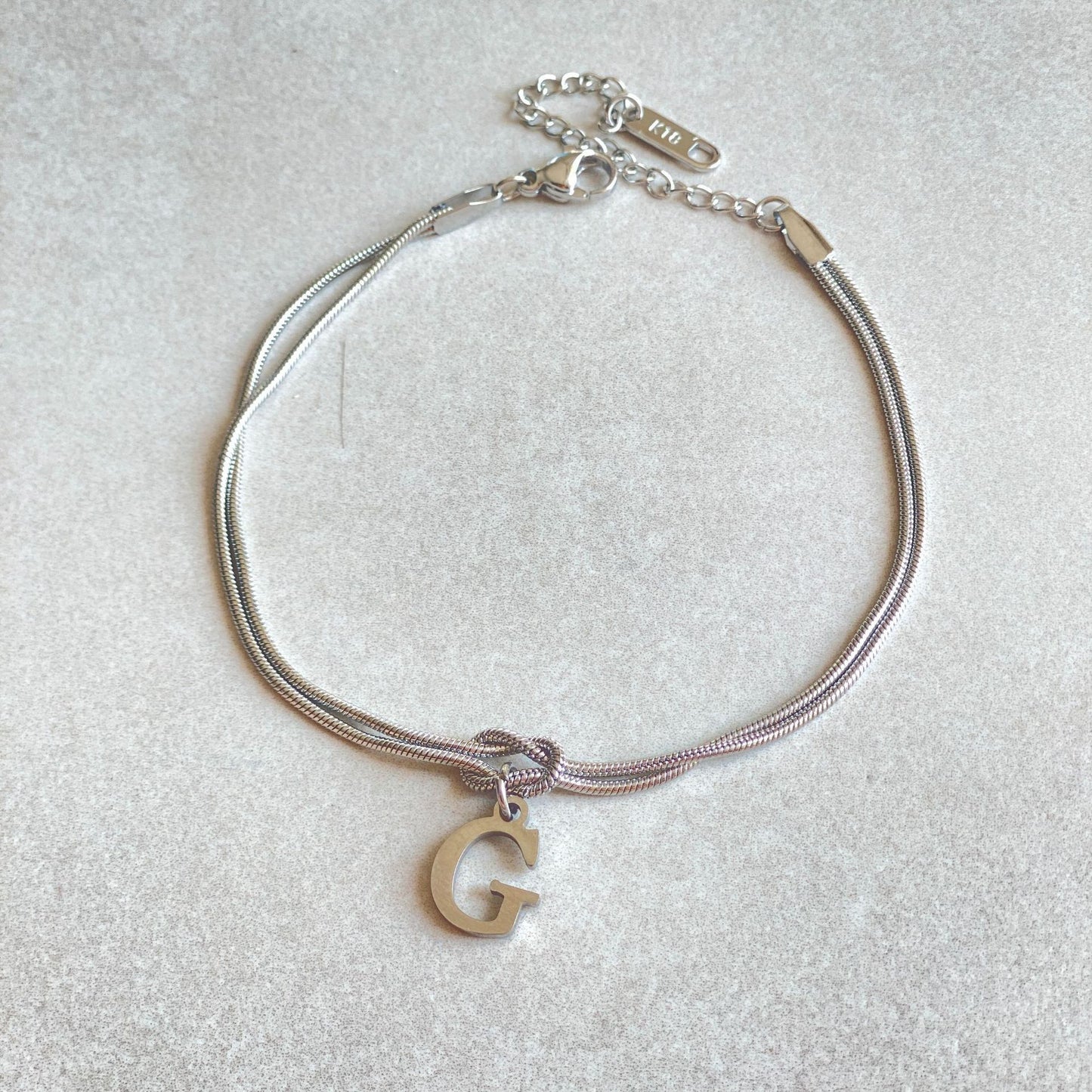 A-Z Love Knot Bracelet – Personalized Gold Charm