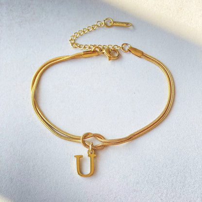 A-Z Love Knot Bracelet – Personalized Gold Charm